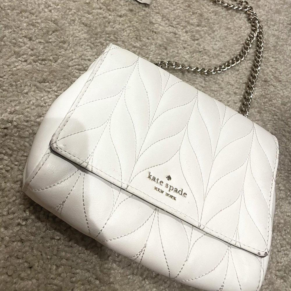 White Kate Spade crossbody with chain strap
